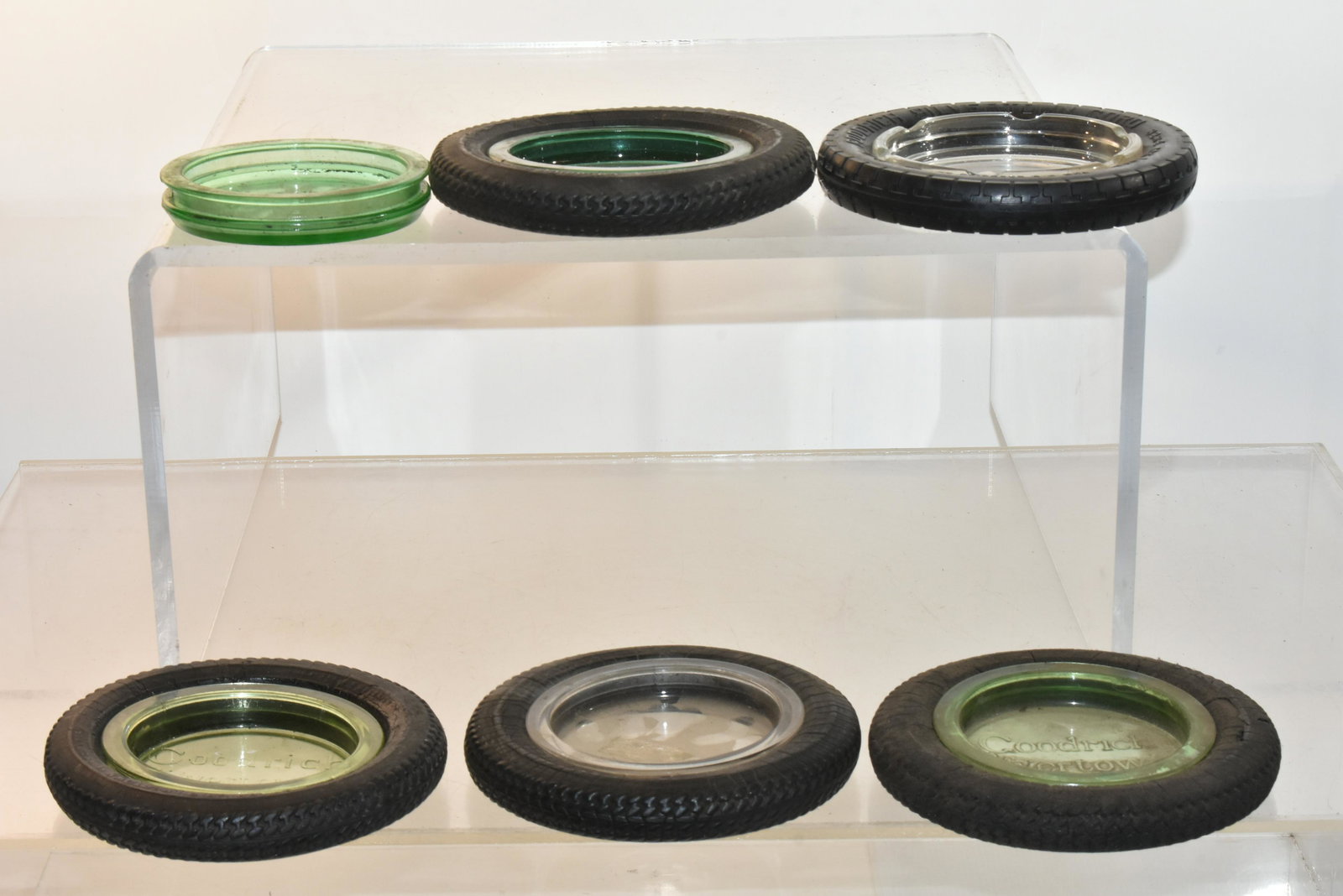 Vintage Goodrich Silvertown Auto Ashtrays: Lot includes (3) Silvertown ashtrays, -(2) with green and (1) with aqua interiors-, (2) with clear interior, and an extra green insert. Some show dry rot. (6 total pieces).