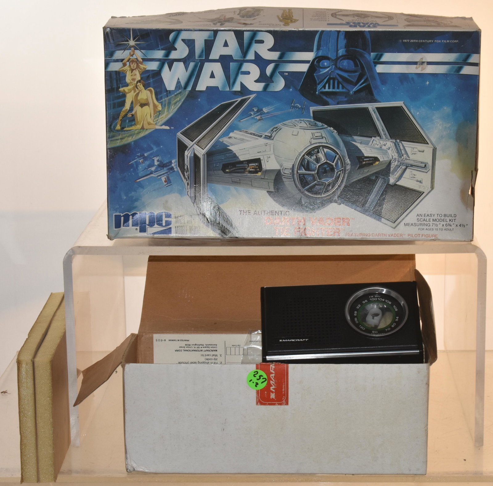 Star Wars Fighter Model and a Radio: Lot includes Darth Vader Tie Fighter model in box, and an AM/FM radio kit, and it is meant to be put together.