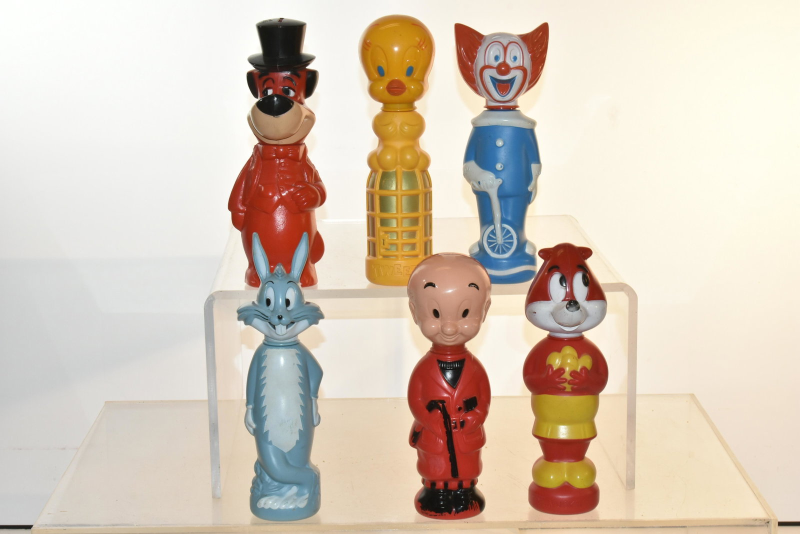 Collection of Soaky Shampoo Bottles: Lot includes Bugs Bunny, Tweety, Yogi Bear, and others. (6) total pieces.