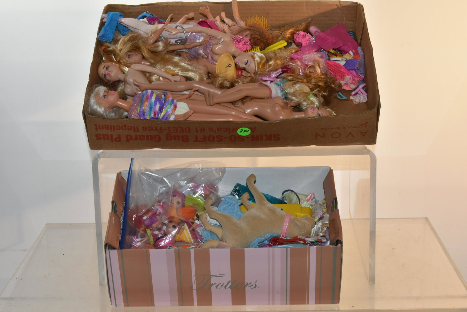 Barbies and Accessories: Lot includes (11) Barbie related dolls, a grouping of accessories, and clothing.