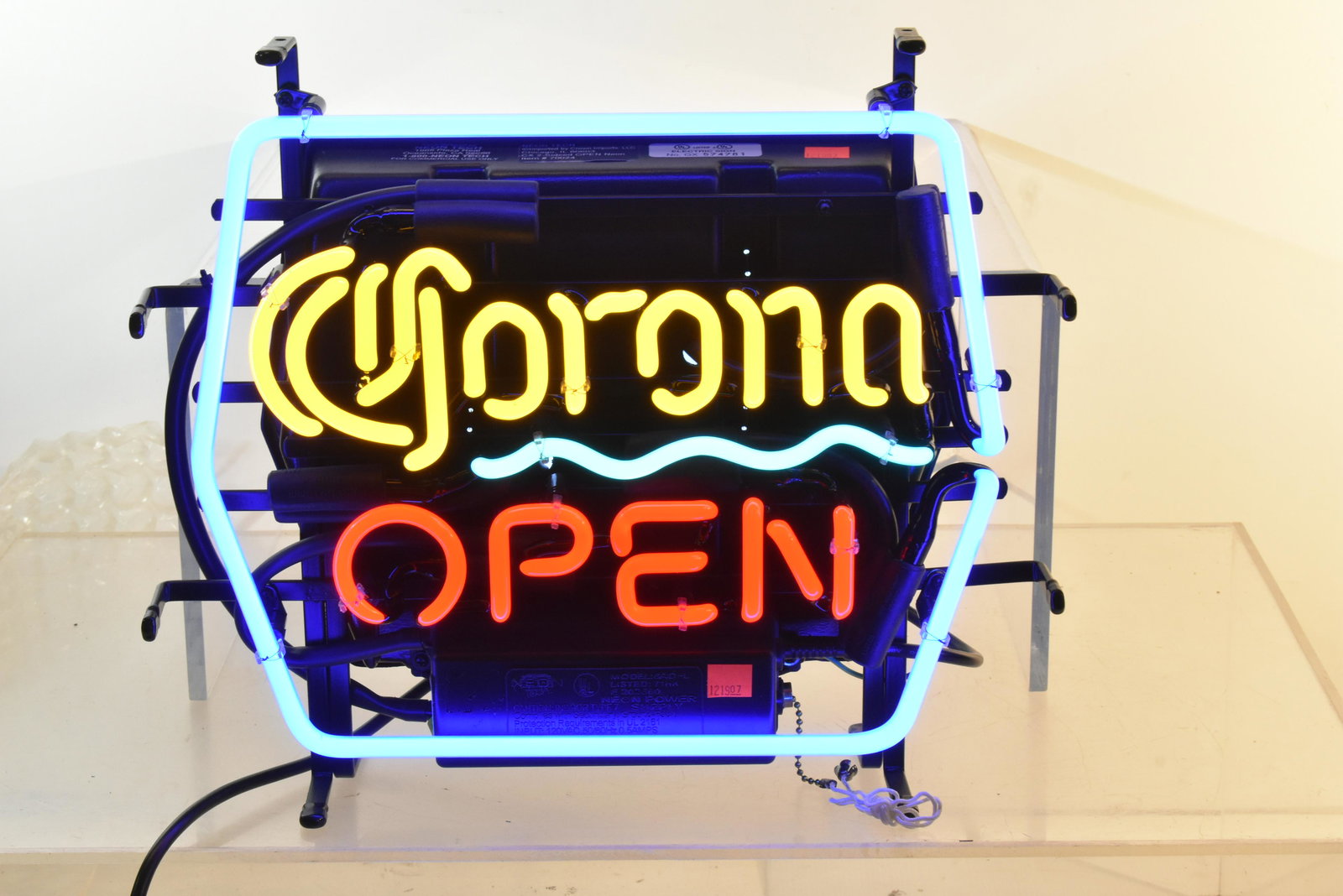 Corona Beer Neon Sign: Item measures approximately 13.5"H x 15"W, and it is in original box. Note: Due to the fragility of this item, pick up is strongly recommended. Otherwise, special shipping considerations should be tak