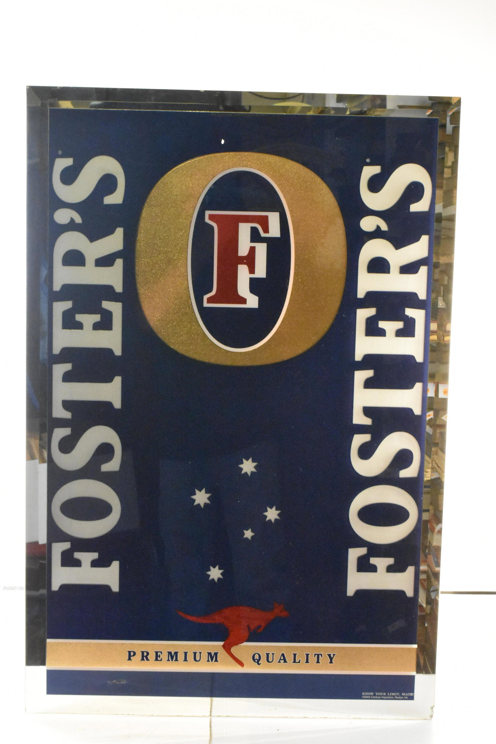 Large Foster's Beveled Mirror Beer Sign: Item measures approximately 24"H x 36"W. It is new in box. Item has two small chips at bottom. Note: Due to the fragility of this item, pick up is strongly recommended. Otherwise, special shipping con