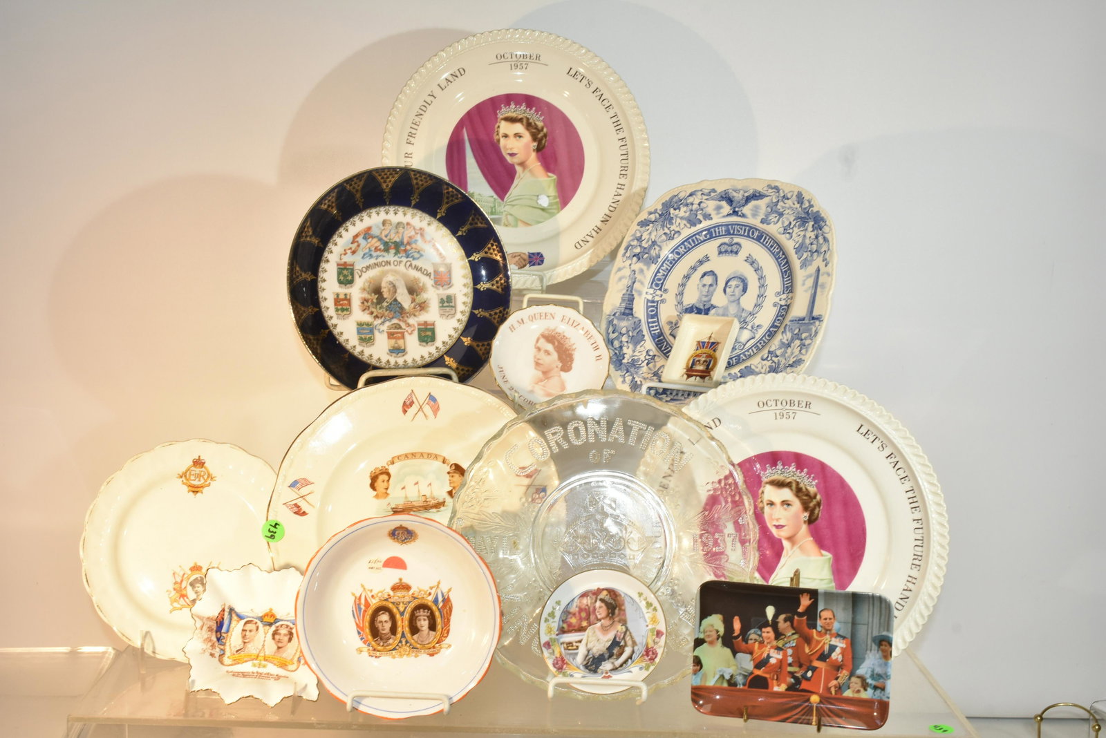 Queen Elizabeth China and more: Lot includes (2) 1957 collector plates, a blue transfer collector plate (all three from her visit to the USA), (2) Canadian collector plates, small coronation items and a coronation of King George VI 