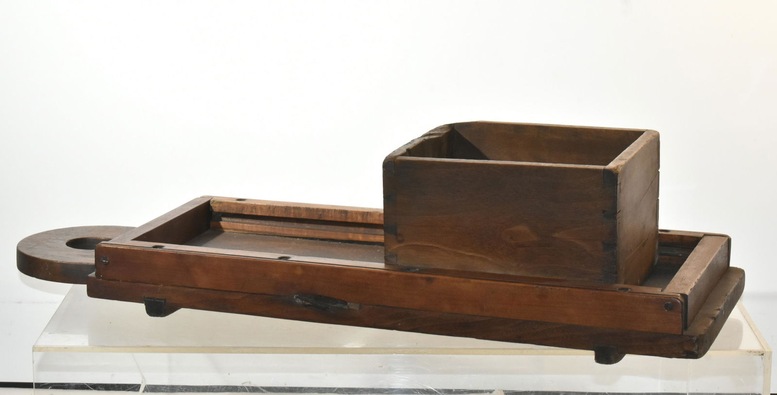 19th C Slaw Board With Dove Tail Box: Item is a lollipop slaw board measuring approximately 19"L. It is walnut and pine construction, with a hand dove tail cabbage box.