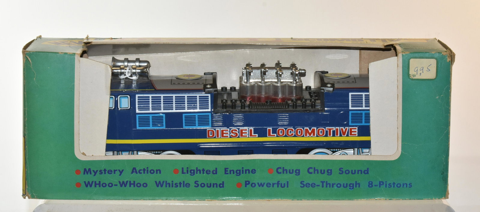 Battery Operated Diesel Locomotive: Item measures approximately 15"L. It is in original box. It was produced by MGH.