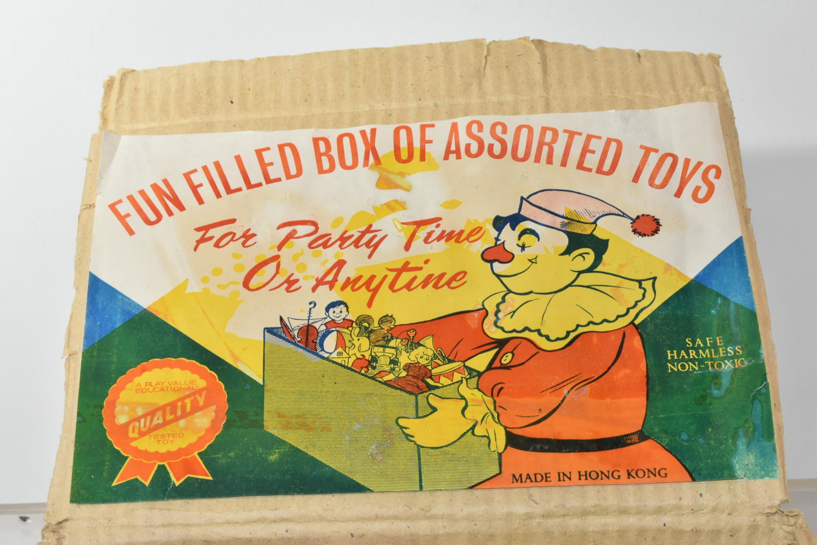 Fun Filled Box of Toys: Box of tin toys on original hang cards in a box that is a store display. It was produced by Quality Tested Toys Hong Kong.