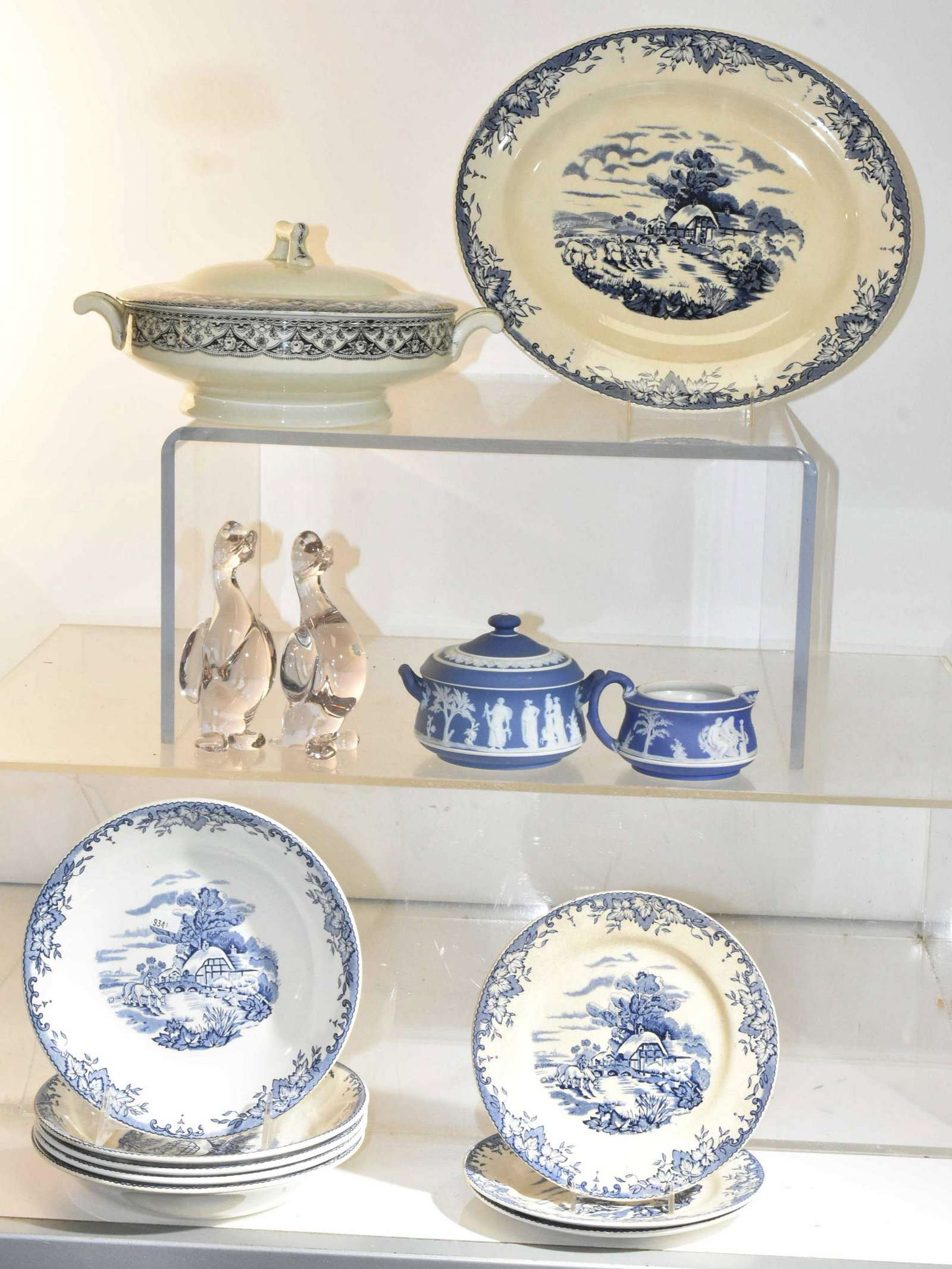 Wedgewood Blue Transfer and More: Lot includes Wedgwood creamer and sugar, (9) pieces of Crown Clarence blue transferware, and (2) Swedish crystal ducks.
