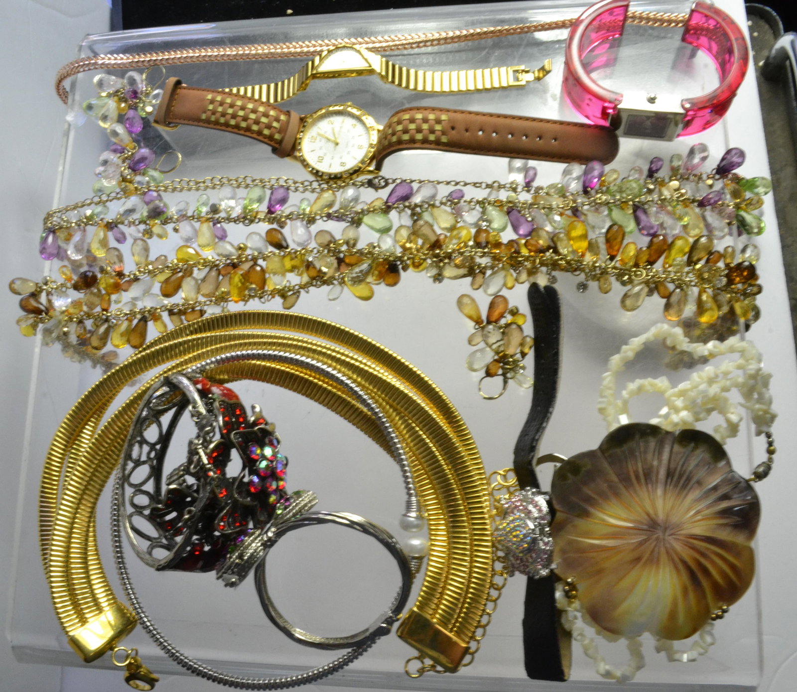 Designer Jewelry and Watches: Lot includes a large red rhinestone rose cuff slave bracelet with ring, seashell, rose, pearl, and gold tone necklaces. Lot also includes Camrose and Kross, Seiko, Suzanne Somers watches, and more.