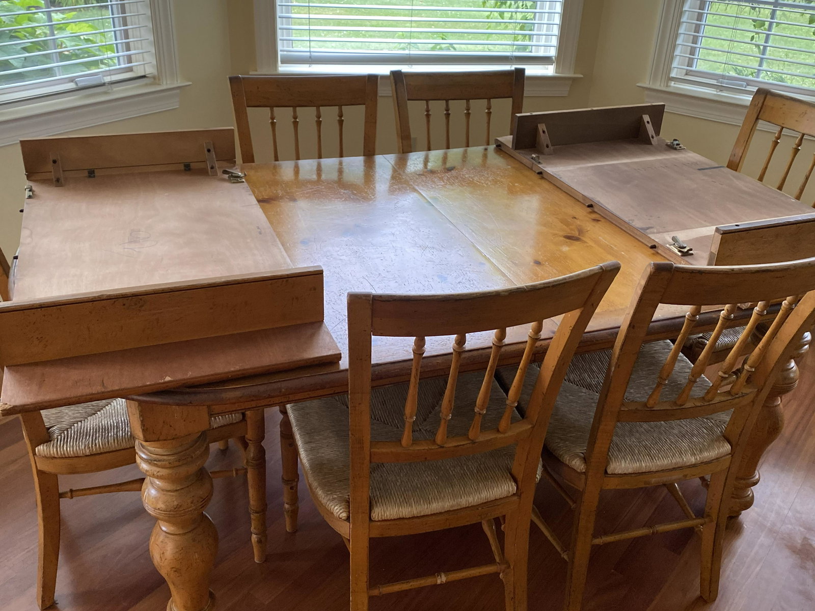 Drexel Heritage Pinehurst Collection Dining Set: Lot includes dining table, chairs, and server/sideboard. Items are distressed pine, attractive antique style set. Dining room includes two leaves, (6) chairs, with a matching server with (8) drawers,