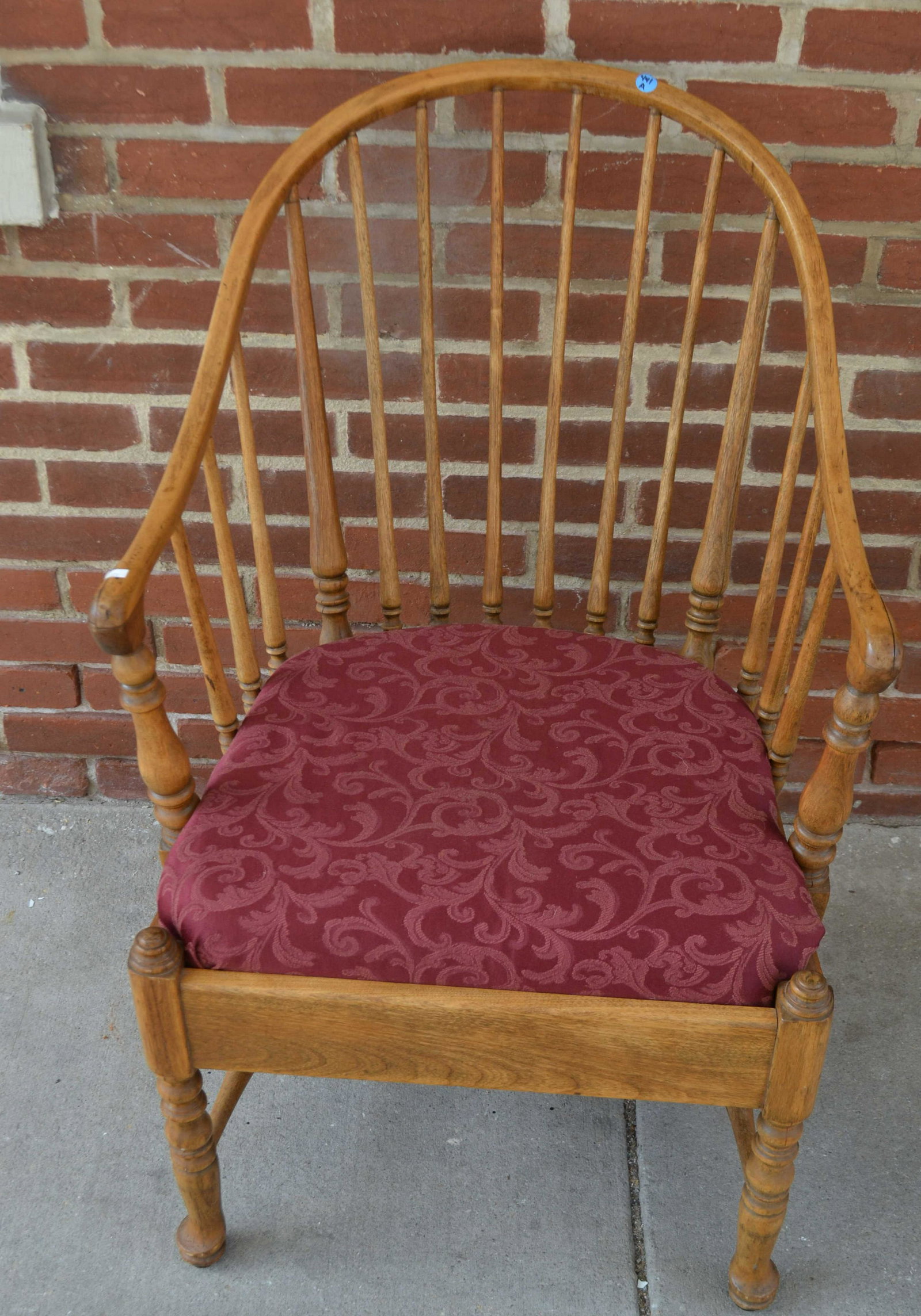 Windsor Style Armchair: Item is maple and hickory construction, and has padded seat. Item dates to the early 20th C.
