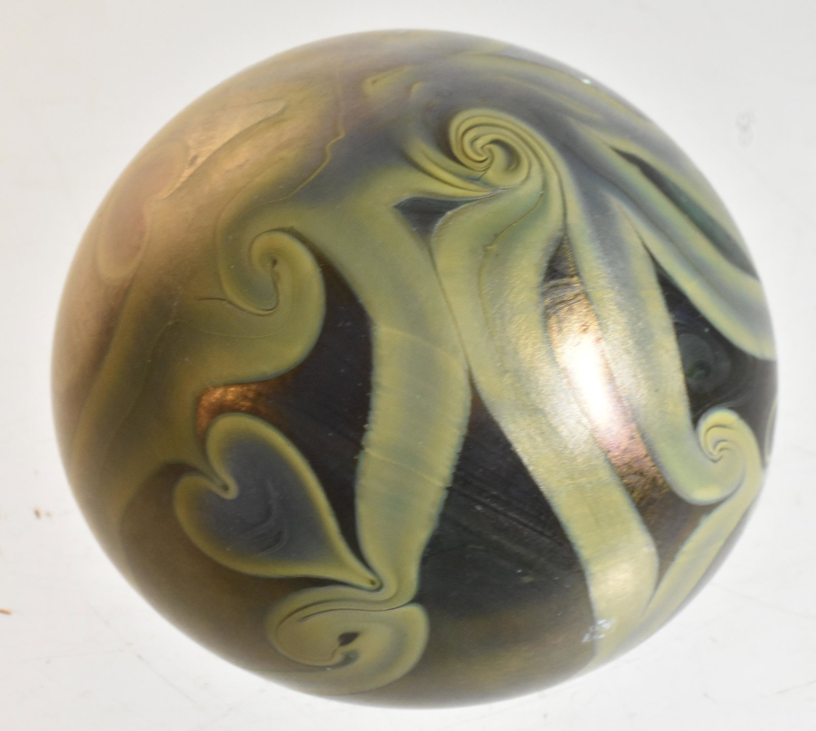 Orient and Flume Art Glass Paperweight: Item measures approximately 2.25"H. It has a heart motif art glass body with linear swirls, and it is marked Orient and Flume 176874 on bottom.