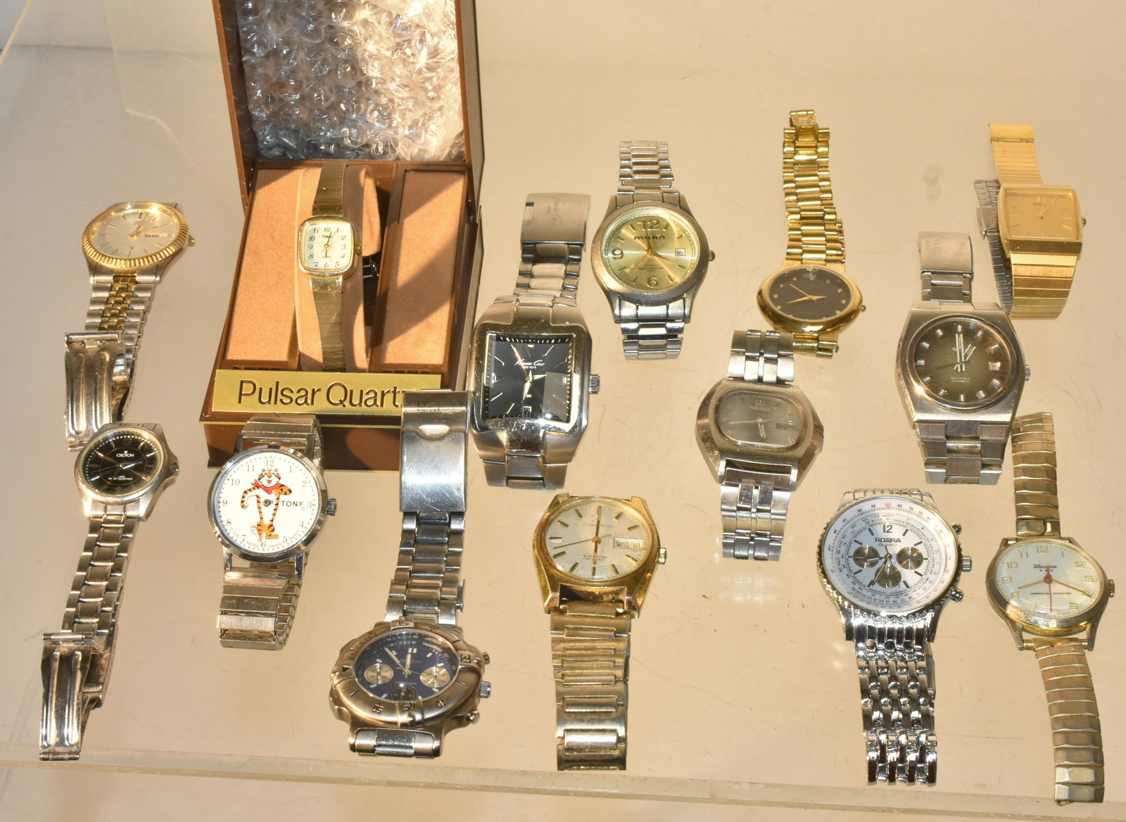 Collection of Men Watches: Lot includes Rosra Divers watch (currently running), a vintage Caravelle with day and date marked Swiss (currently running), Helbros Diamond Quartz, a Nautica Chronograph, a Lucerne (Swiss Made), a Cr