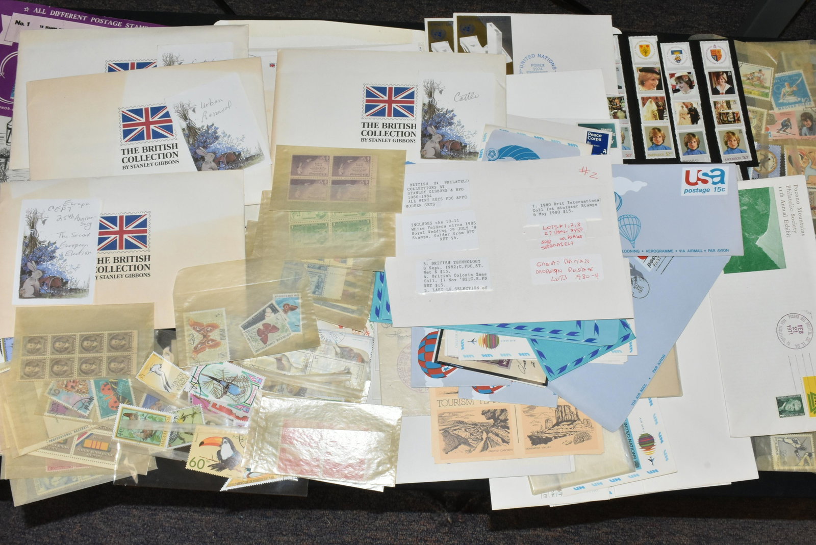 Stanley Gibbons British Stamp Sets: Lot includes the Royal Green Jackets, British Gardens, British Engineering, Commonwealth Day, British Fairs, Royal Wedding, and other related items.
