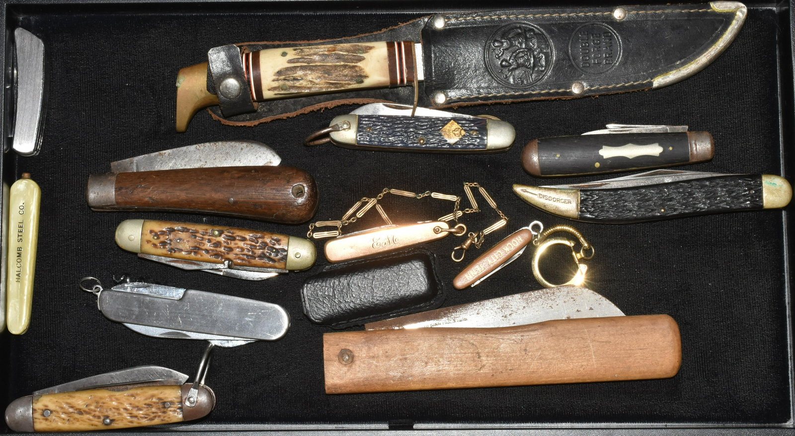Pocket and Sheath Knives: Lot includes a York Cutlery German Sheath knife with antler handler, Boy Scout knife, Camco folding fishing knife, and various others.