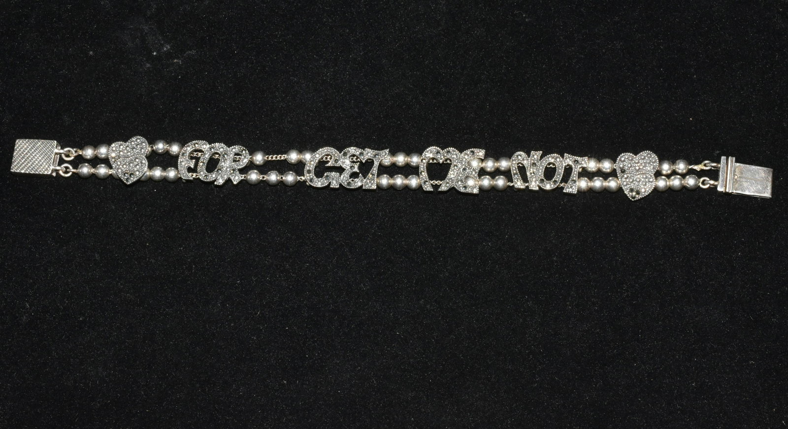 Estate Sterling Bracelet: Vintage sterling silver "Forget Me Not" bracelet with marcasite.