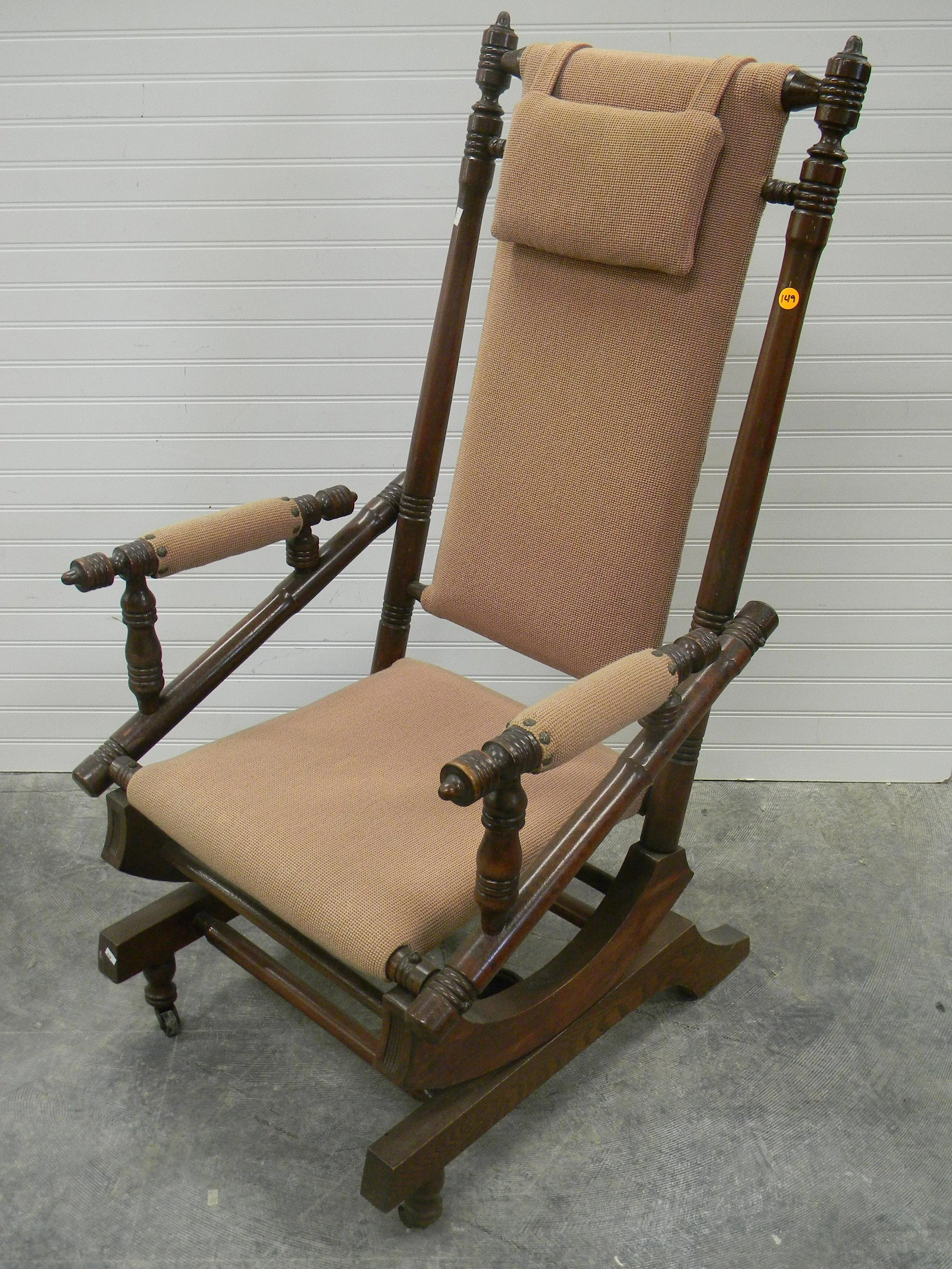 Victorian Spring Rocking Chair: Spring loaded rocking chair with turnings on body and a padded back and seat.