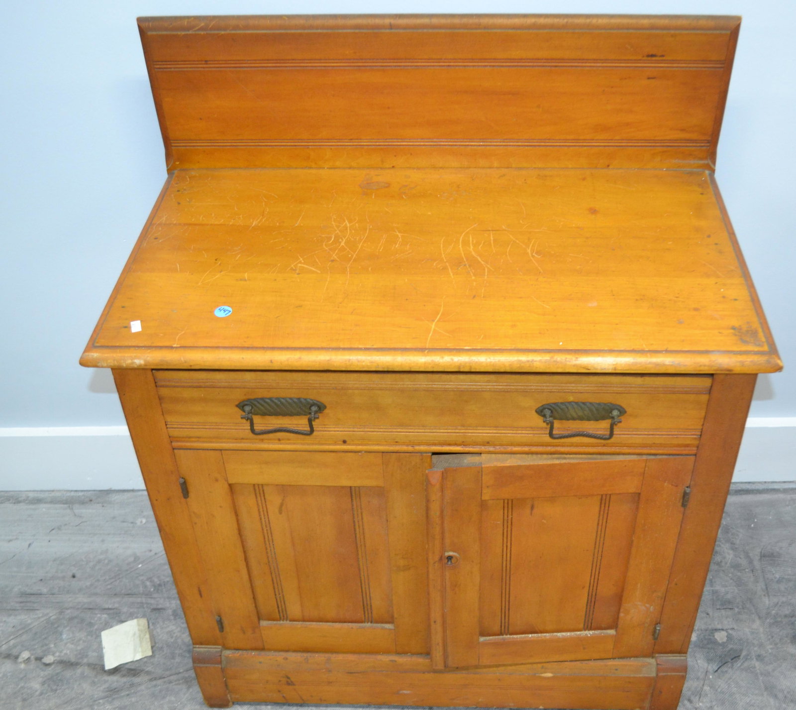 Softwood Washstand: Item measures approximately 36"H x 30"W x 16"D. It has a simple country form, and original brasses.