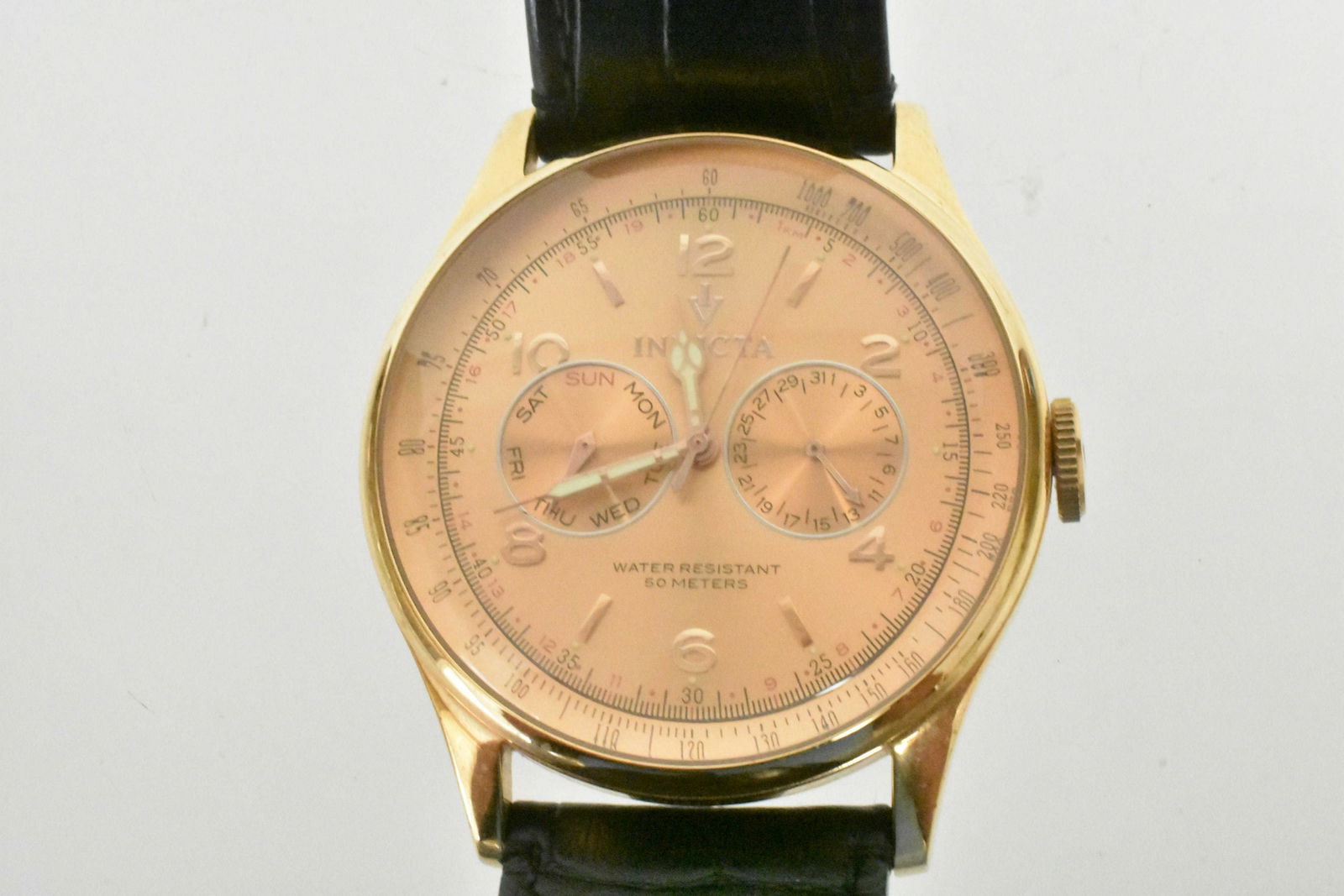 Invicta Watch Model #6752: Invicta watch model #6752. 45mm stainless steel case with a black leather band. Watch has a China Quartz movement and is water resistant (50m). Band measurements are Length: 235mm Size: 24mm.