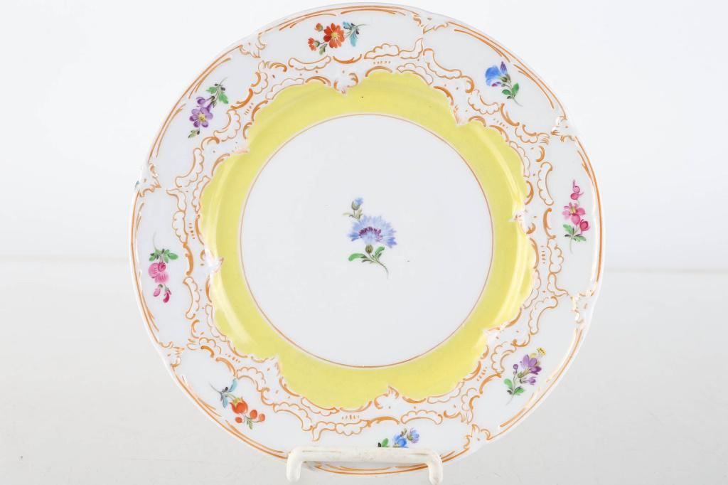 Hand Painted Meissen Plate: Approximately 7.5" diameter. Hand painted floral design. Meissen cross sword mark on bottom, with impressed No. 159. Initial K, with numbers of artist on back.