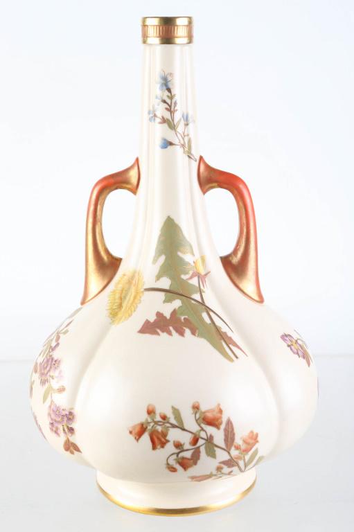 Hand Painted Royal Worcester Two Handled Vase: Approximately 13"H. Hand painted dandelions and various wildflowers on body. Gold flashing at top. Free of chips and cracks. Aqua Royal Worcester mark on bottom, Pat. Metallic. Also numbered 764.