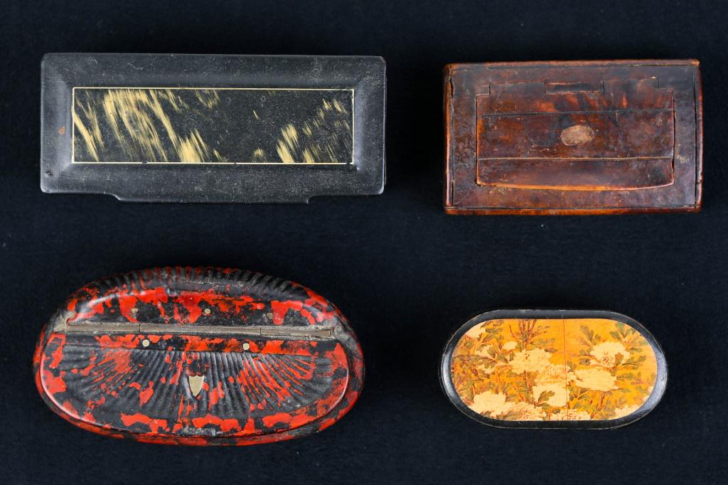 19th / Early 20th C Patch/Pill Boxes: Largest approximately 4" across. Black with marbleized top. Also included are a clamshell box with mottled red and black surface with minor wear inside opening, a leather covered stamp box, and a hard
