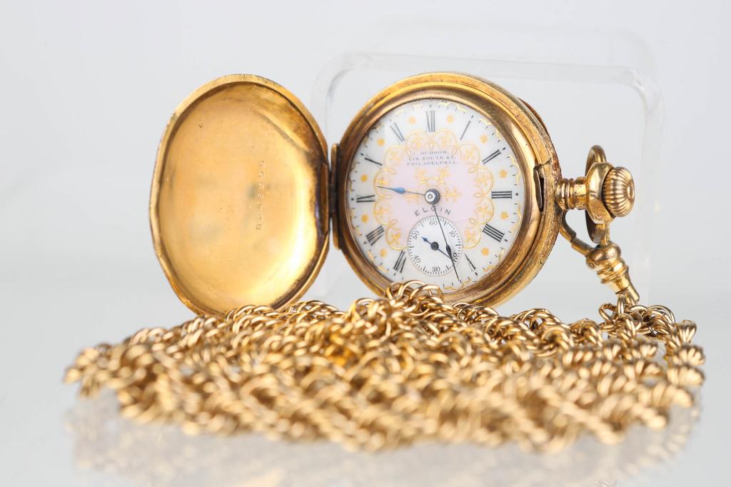 Vintage Elgin Pocket Watch with Monet Fob: Watch measures approximately 1.25" in diameter. Watch has an enamel face with gold decoration reading, "I. Dubrow 618 South Street Philadelphia Elgin. Case # 8248555". Hunt case was made by Philadelph