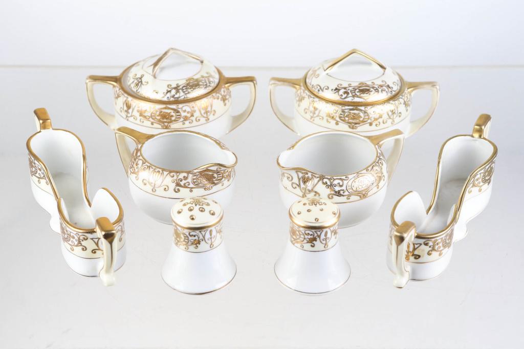 Noritake / Nippon No 175 Christmas Ball Serving Pc: includes (2) creamers and sugar (one shows wear to gold flashing at top of handle), salt and peppers, and (2) napkin holders. All have good gold enameling. All have Noritake mark (all have green mark,