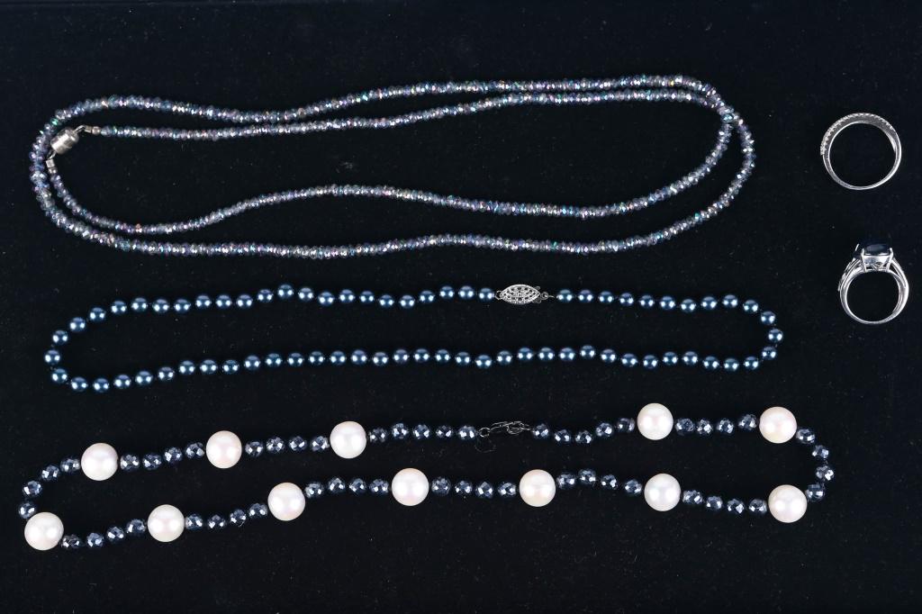 Colored Pearl and Stone Estate Jewelry: includes black pearl necklace with enhanced silver clasp, white pearl and hematite necklace with silver clasp, long hematite necklace with silver clasp, and (2) sterling rings with stones.