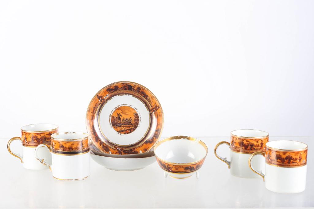 Chinese Export Tea Service: includes a French market part tea service with (4) coffee cups (one as-is), (1) tea cup, and (3) saucers (one repaired). Circa 1820.