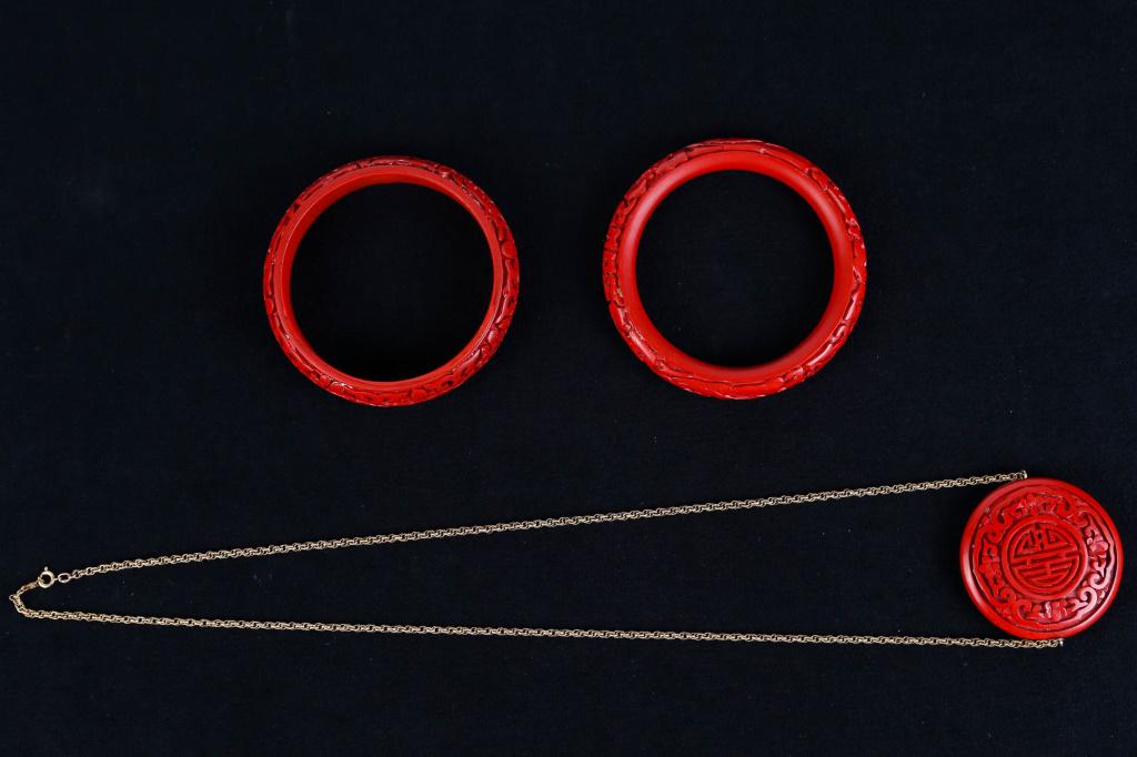 Vintage Cinnabar Jewelry: includes a cinnabar necklace with Chinese symbols on a long gold fill chain, and two floral carved bangles.