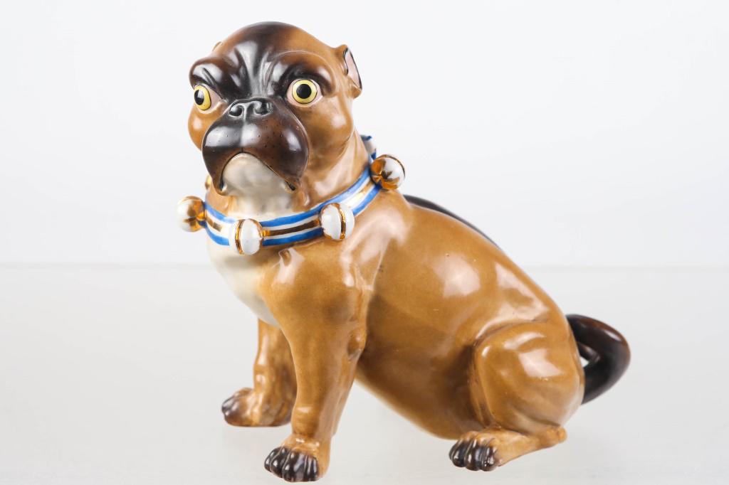 Meissen Style Pug Dog Figure: Figure measures approximately 7.5"H. It depicts a seated Pug dog with bell collar. Numbered 35 on bottom. No other markings, no visible flaws.