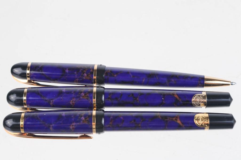 Waterman Pens: Three French Waterman Pens with blue and black camouflage-like design and gold outlining throughout