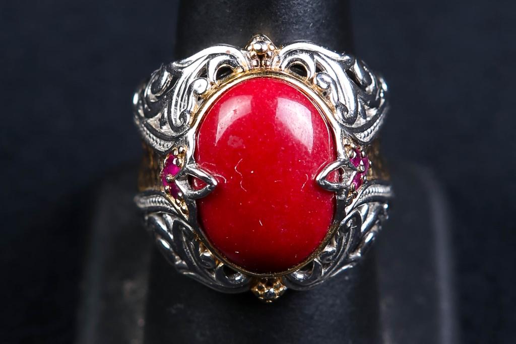 Carnelian and Sterling Ring: Large cabochon carnelian stone, accented with six small ruby stones in vermeil.