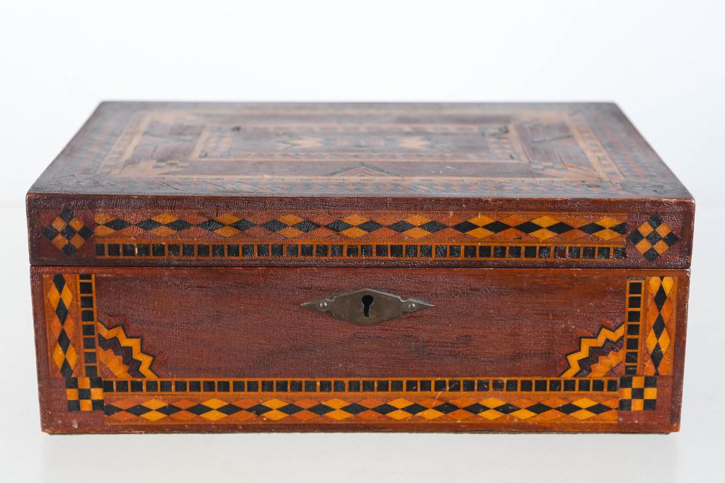 Antique Marquetry Jewelry Box: 19th C wooden inlayed marquetry box with intricate design. Lined in suede with pocket watch and other compartments.