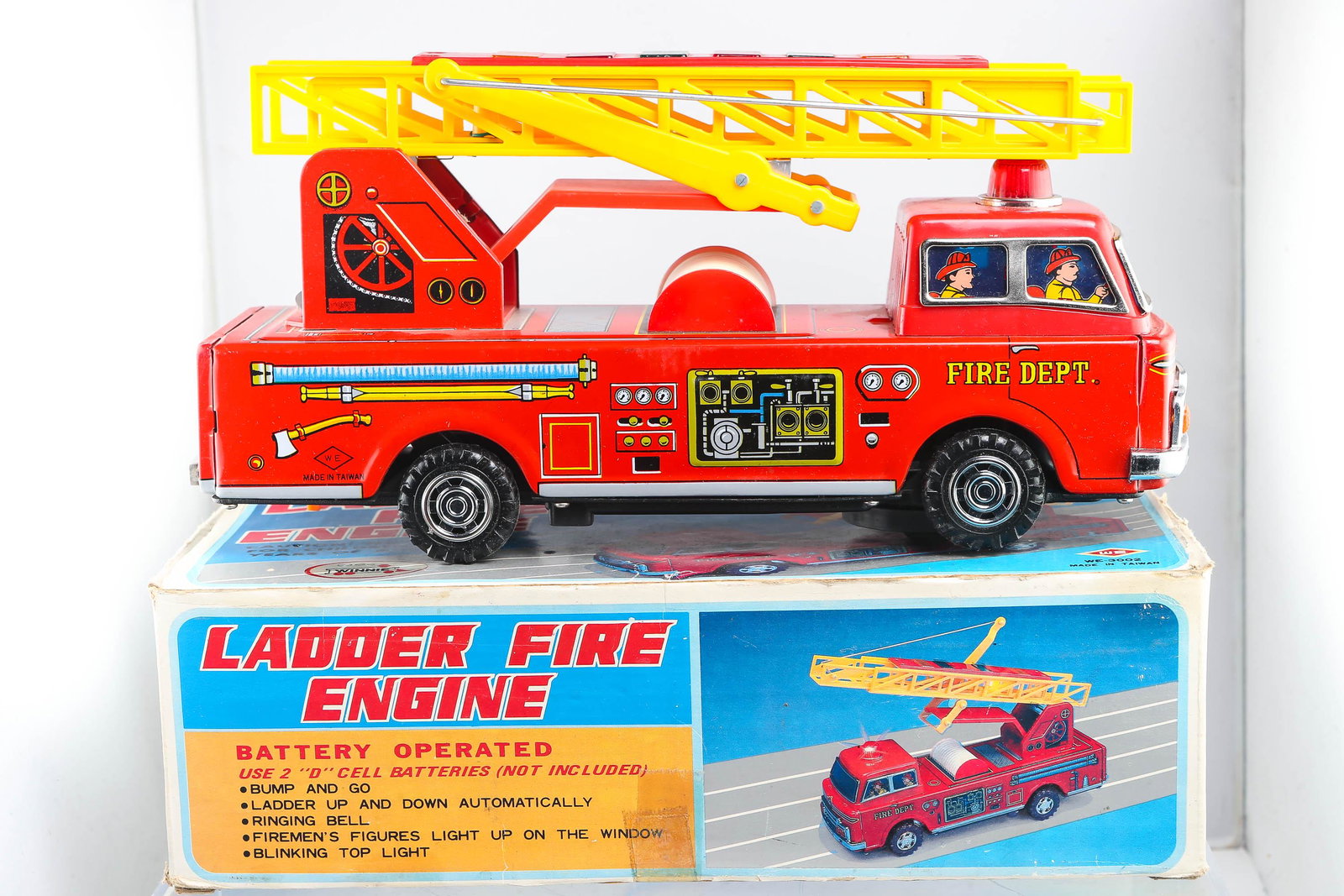 Winnie Ladder Fire Truck, Bat. Op., in OB: Fire engine battery operated action include bump and go, ladder up and down auto., ringing bell, and several lights. Model #3002 made in Taiwan. Condition is like new. Circa 1960 measures 12" long. So