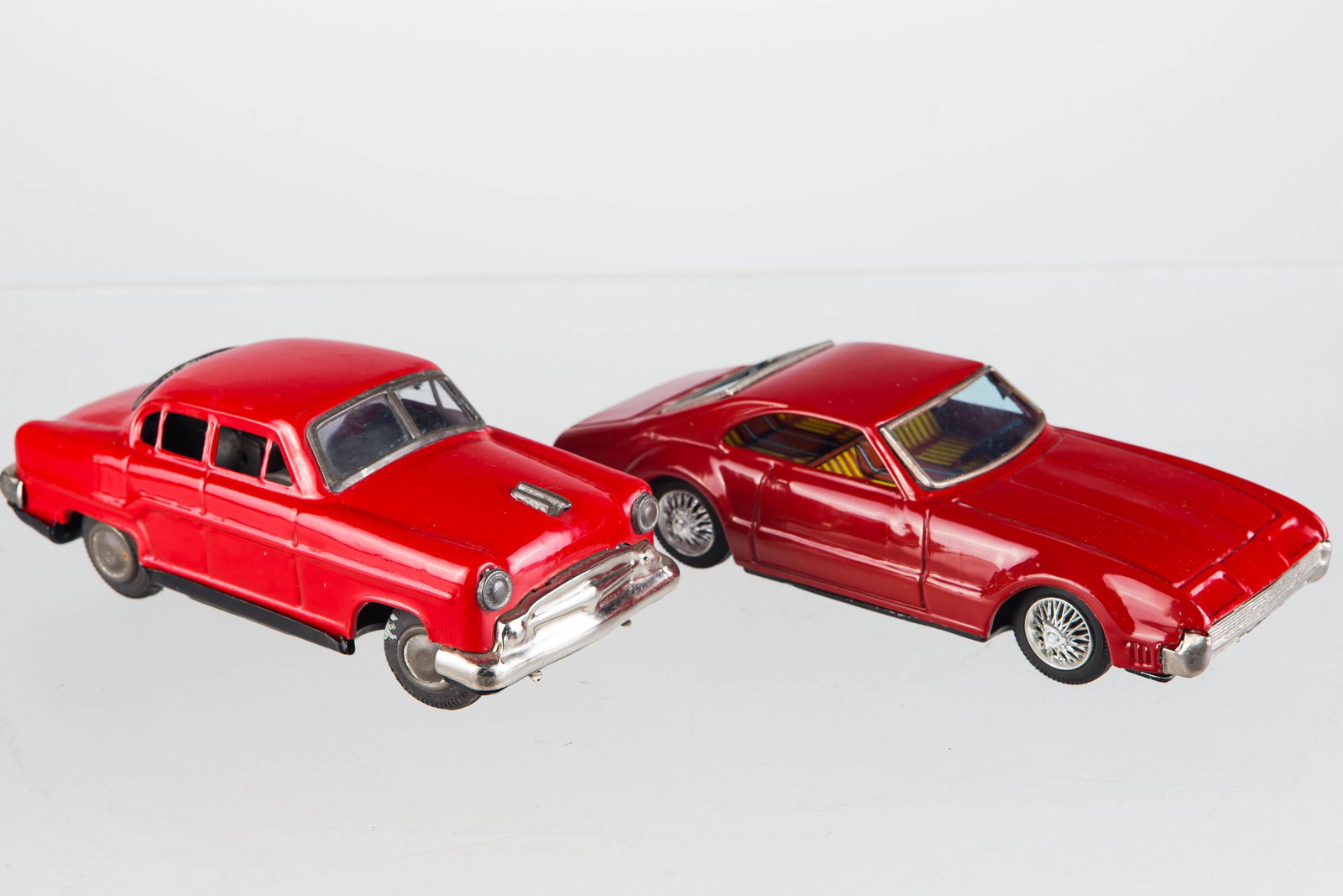 Fat Boy Car and Friction Car, Bat. Op.: Bandai Friction Japanese Tornado car measures 8 1/4" long, works well with very light scratches to body. Battery operated fat boy car has some red paint touch up to body and some imperfections to tire