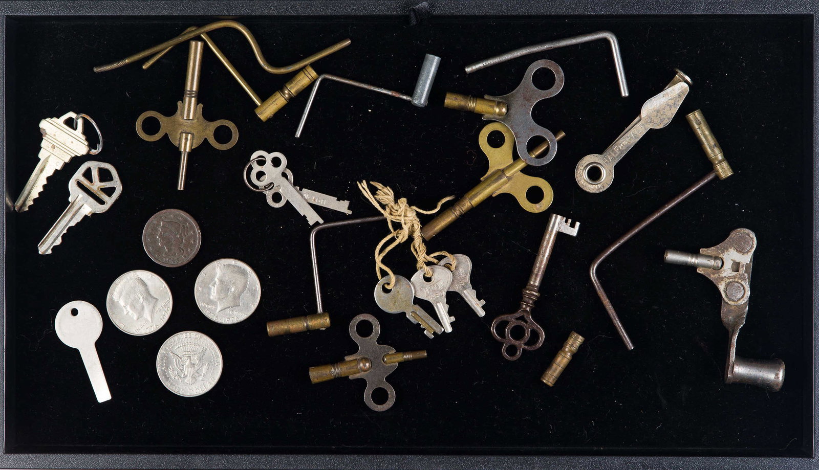 Collection of Keys and Coins: Lot includes a selection of various clock keys, other keys, an 1845 US large cent, 2 Bicentennial Kennedy Halves, and a 1973 Kennedy Half.