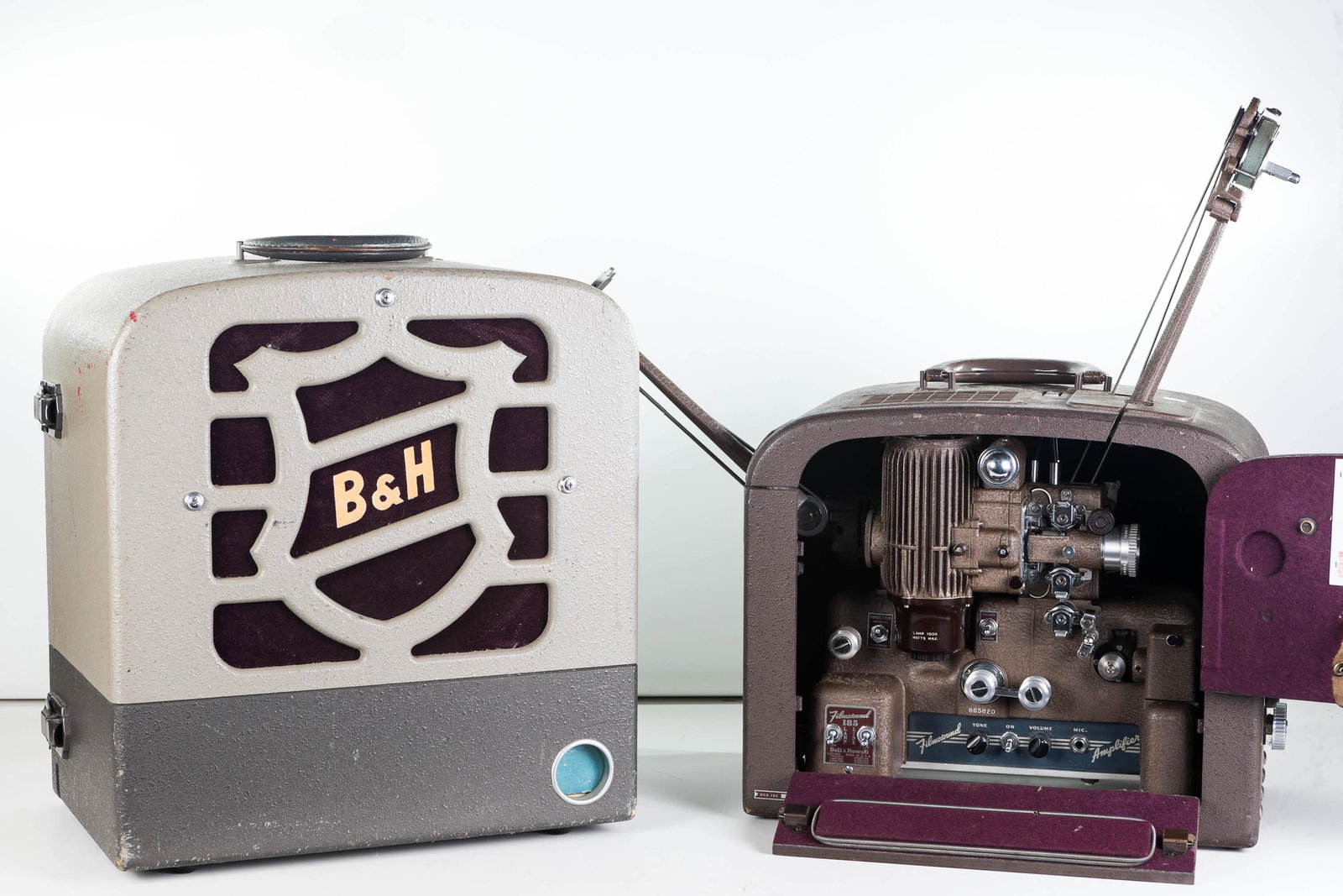 Vintage B&H Projector and Extension Speaker: Speaker case approximately 18"H. Contains a B&H speaker, and a large supply of cords. Good grill with B&H logo. Lot also includes a vintage B&H Real to Reel movie projector with amplifier. Filmo-Sound