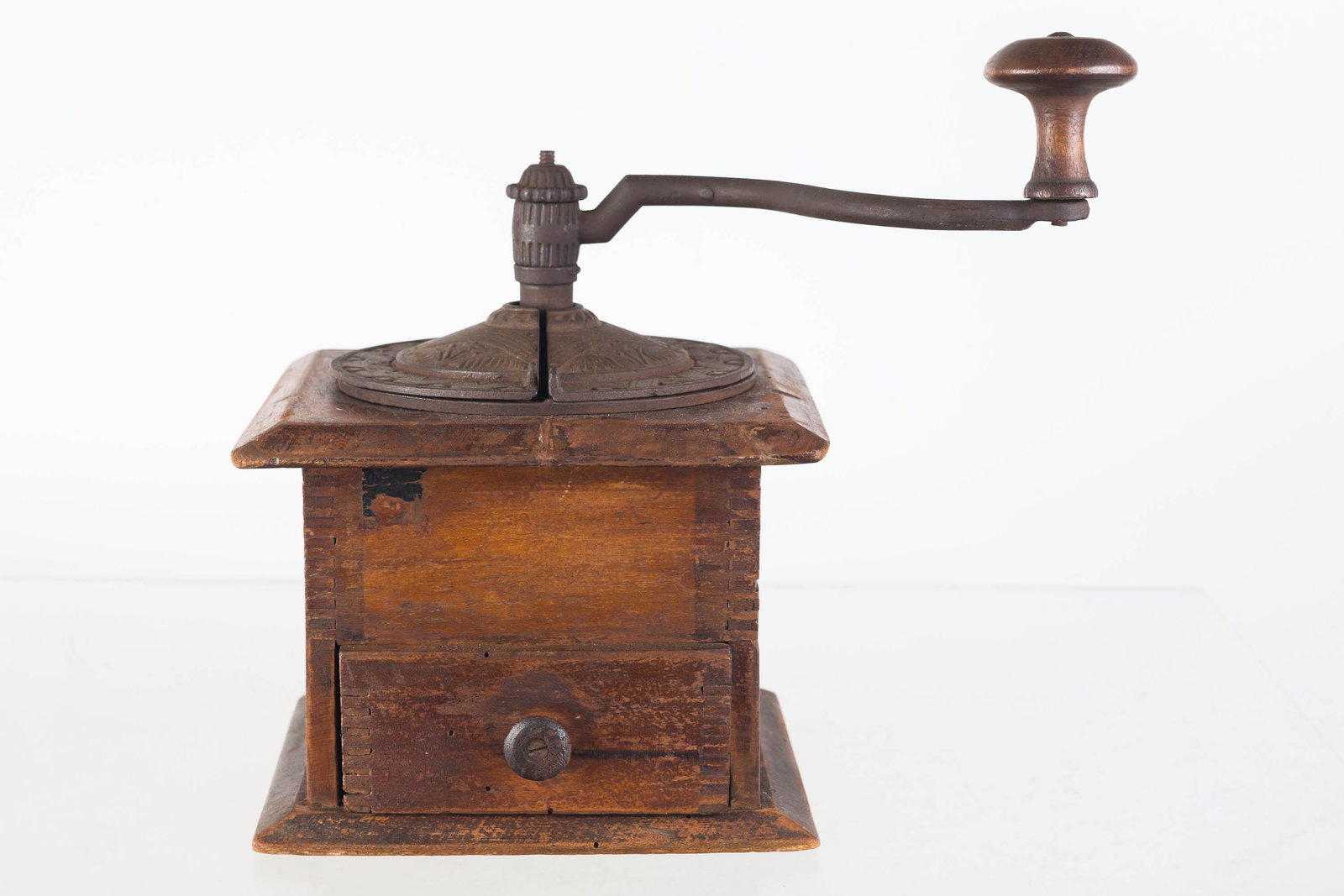 Vintage Coffee Grinder: Approximately 8"H. Finger jointed body. Cast iron hardware. Fully functional.