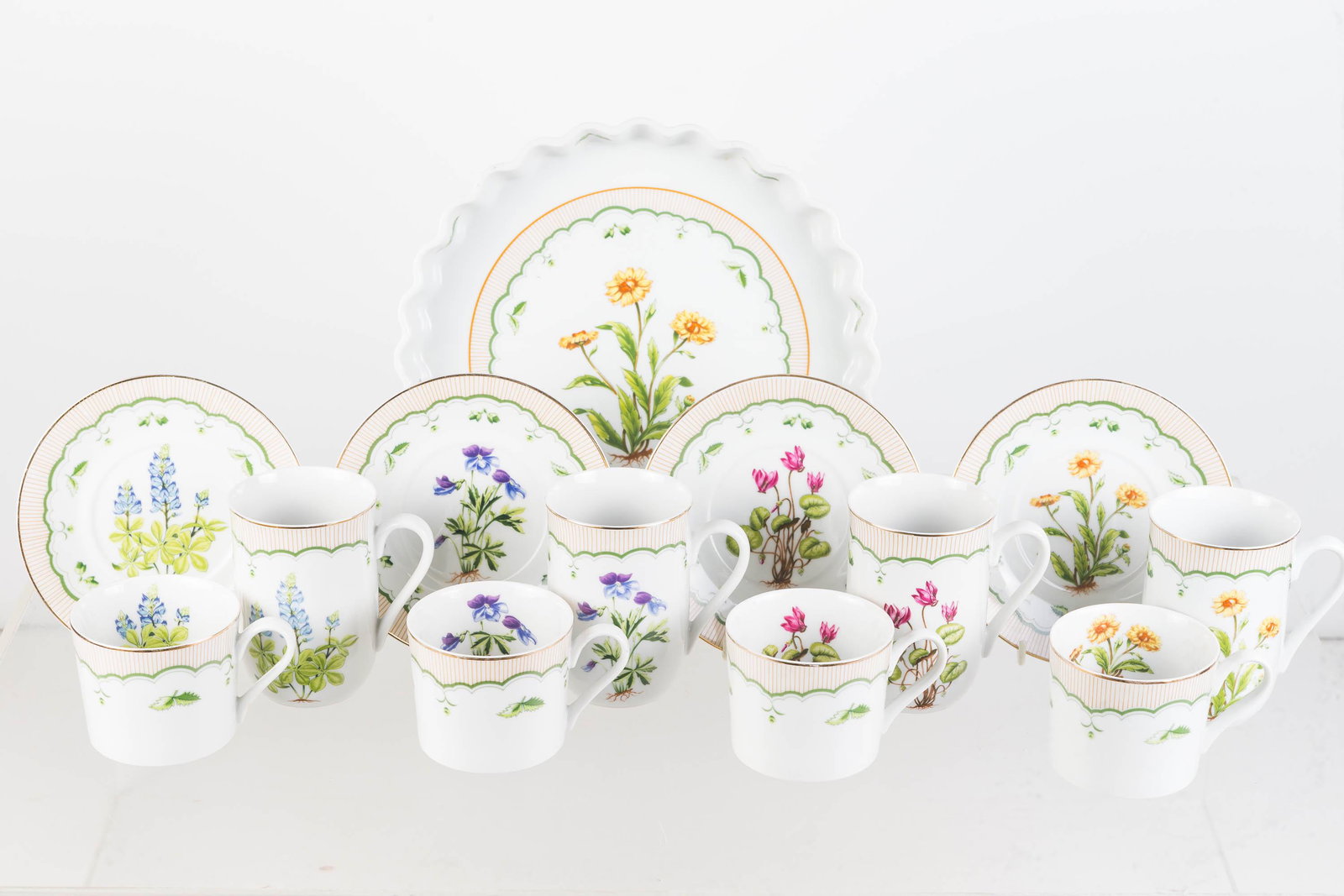 Georges Briard Victorian Gardens China: Lot includes four cups and saucers, four coffee mugs, and one quiche dish. Floral decoration.