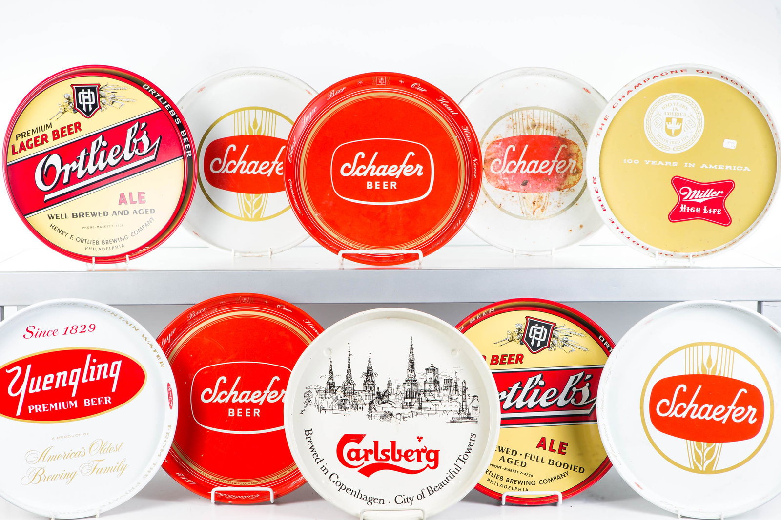 Advertising Beer Trays: Lot includes Schaefer, Carl's Berg, Ortleibs, Yuengling, and others. Some how common wear. 10 total pieces.