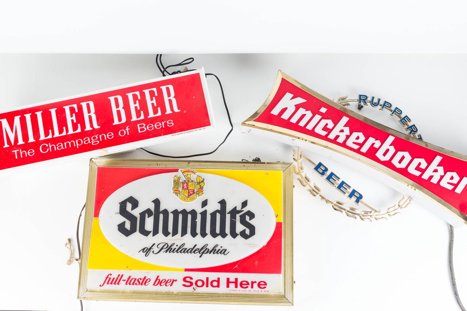 Advertising Beer Lights: Lot includes Ruppert Knickerbocker Beer (23" across), a Schmidt's of Philadelphia and a Miller beer light.