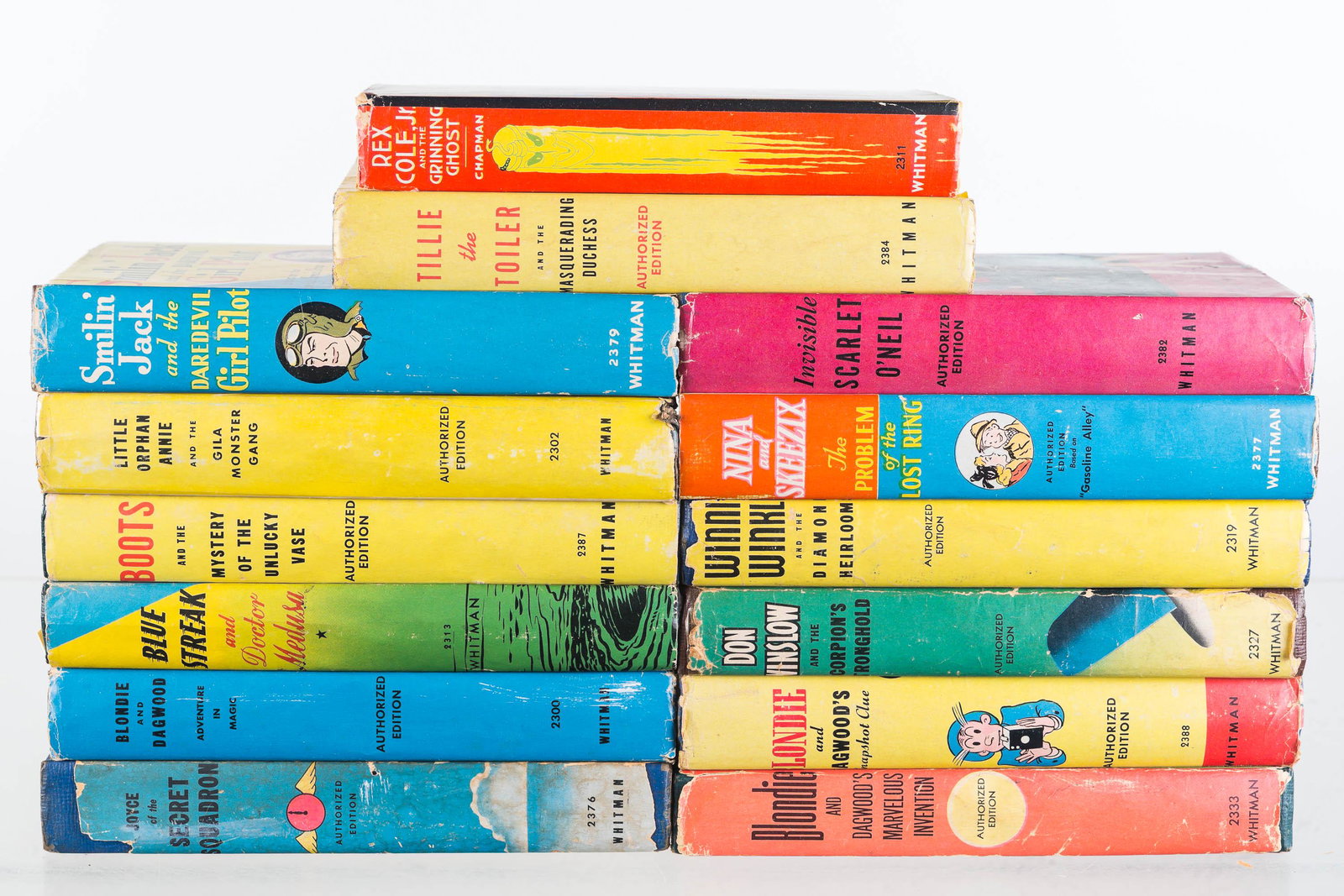 Vintage Hardback Children's Books: Including Don Winslow, Blue Streak, Boots, Tillie the Toiler and others.