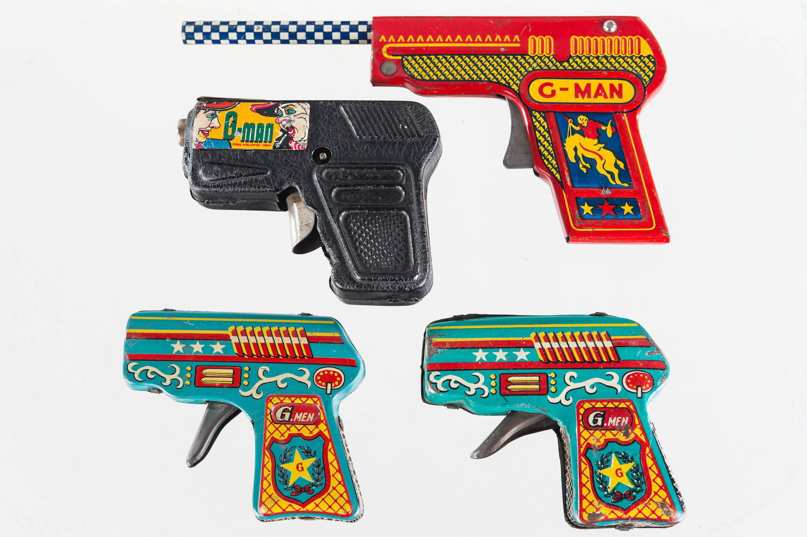 G-Man and G-Men Pistols: Lot includes 4 pistols. All are complete, 3 are not functional. All have good lithography with common wear. Toy.