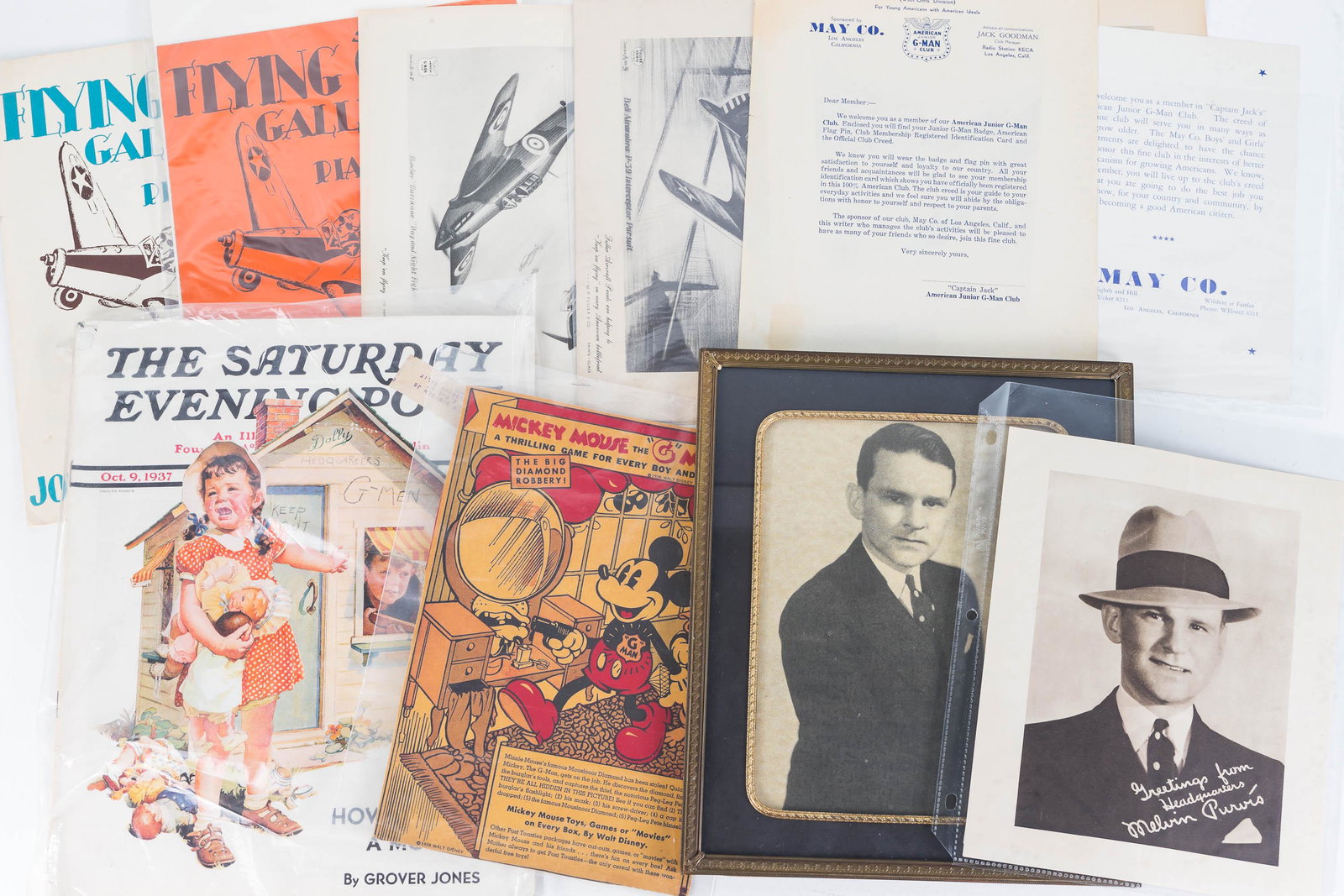 FBI and G-Man Ephemera Grouping: Lot includes framed and unframed photos of Melvin Purvis, G-Man piano solo, Captain Jack's American Junior G-Man ephemera, flying G-Man piano solo, 1937 Saturday Evening Post, and 1936 Mickey Mouse th