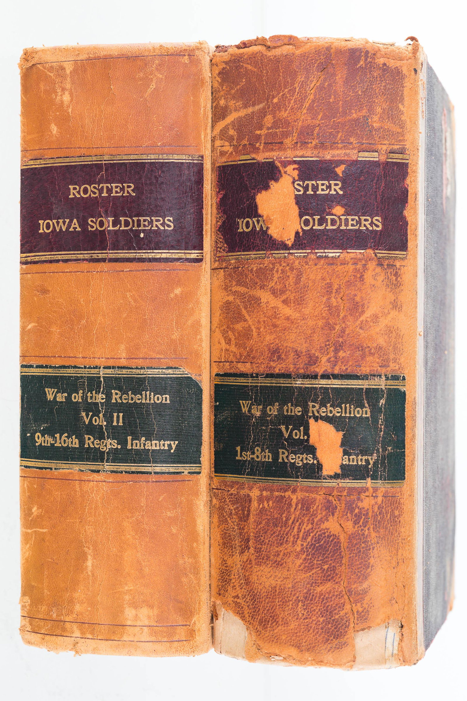 Roster of Civil War Soldiers (1908): Lot includes a two volume leatherbound set. Full title: "Roster and Record of Iowa Soldiers in the War of the Rebellion 1861-1866". Published 1908. Both leatherbound books show common wear to covers. 