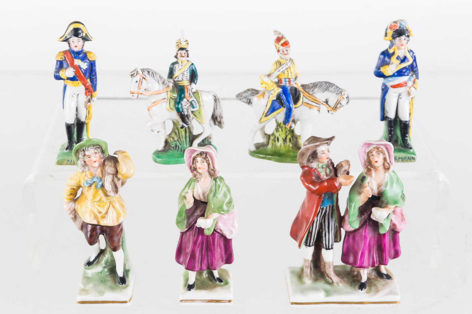 Erphila German Miniature Porcelain Figures: Largest approximately 3.5"H. Several various hand painted Erphila figures. One soldier on horseback shows loss to handle of sword. Other figurines have no visible flaws.