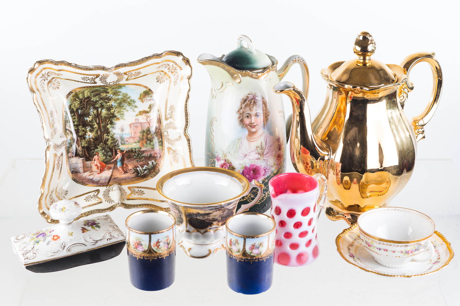 Porcelain, China and Glass inclu Chocolate Pot: Lot includes an Imperial Crown chocolate pot (German), gold tone coffee pot (Kronester Bavaria Germany), Austrian rectangular dish, a small cup with cross sword mark, and other items