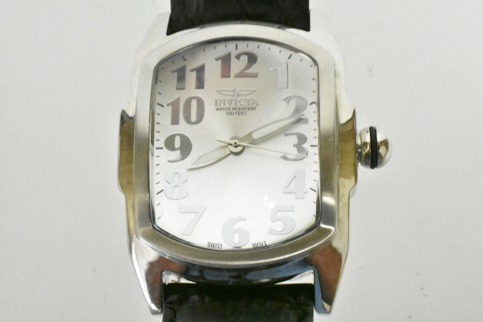 Men?s Invicta Watch Model #5726: Men?s Invicta watch model #5726. Case is 39mm, stainless steel case, leather band, and a Swiss quartz movement. Watch is water resistant (30m). Black tone genuine leather band measures Length: 210mm,