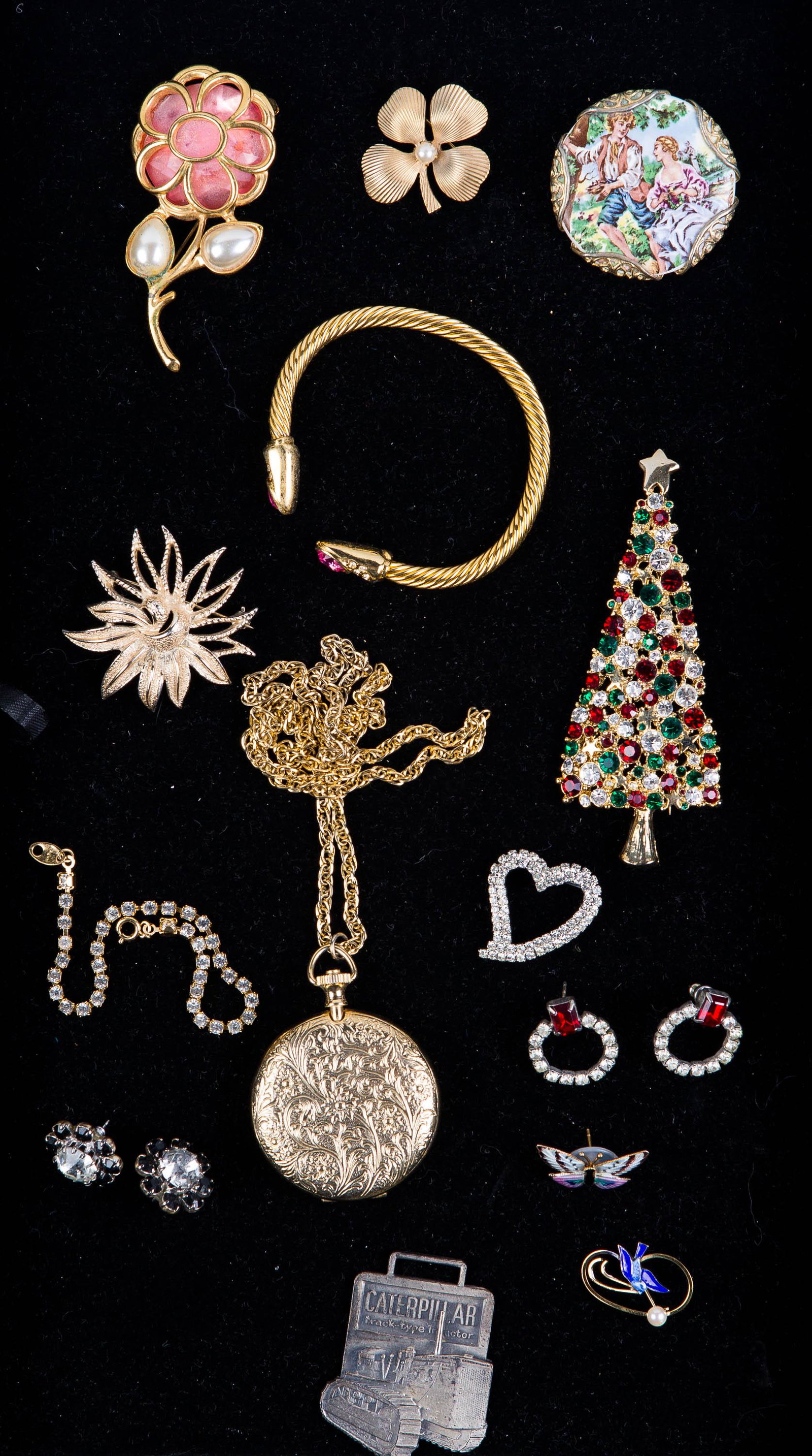 Vintage Brooches: Lot includes large Christmas tree brooch, rhinestone and other brooches, locket, and caterpillar watch fob.